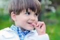 Why does a child bite his nails: How to wean from a bad habit?